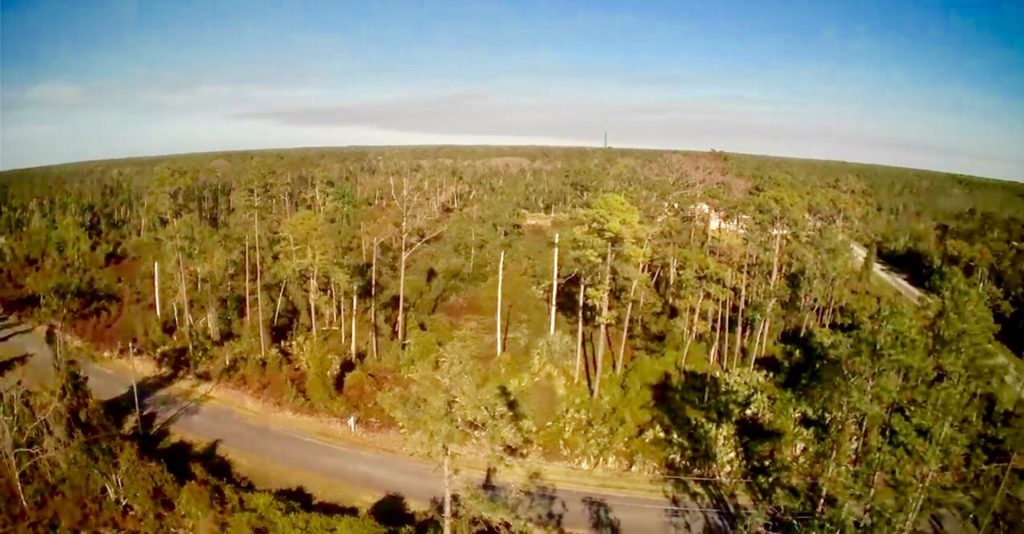 5.27 acre lot on paved road in subdivision of estate homes! Susan