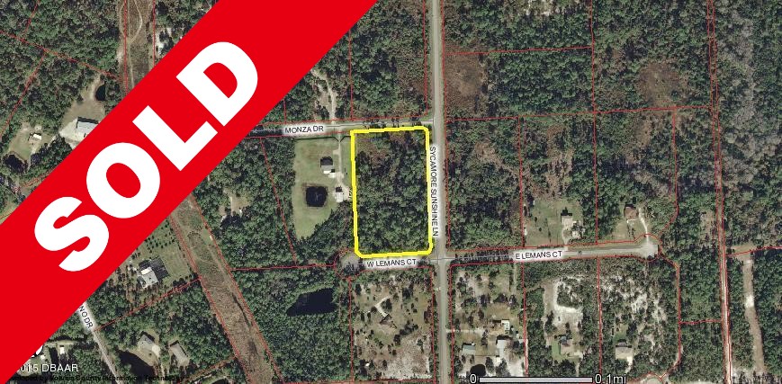 SOLD! Beautiful 5.08 acre lot on paved road in Samsula!