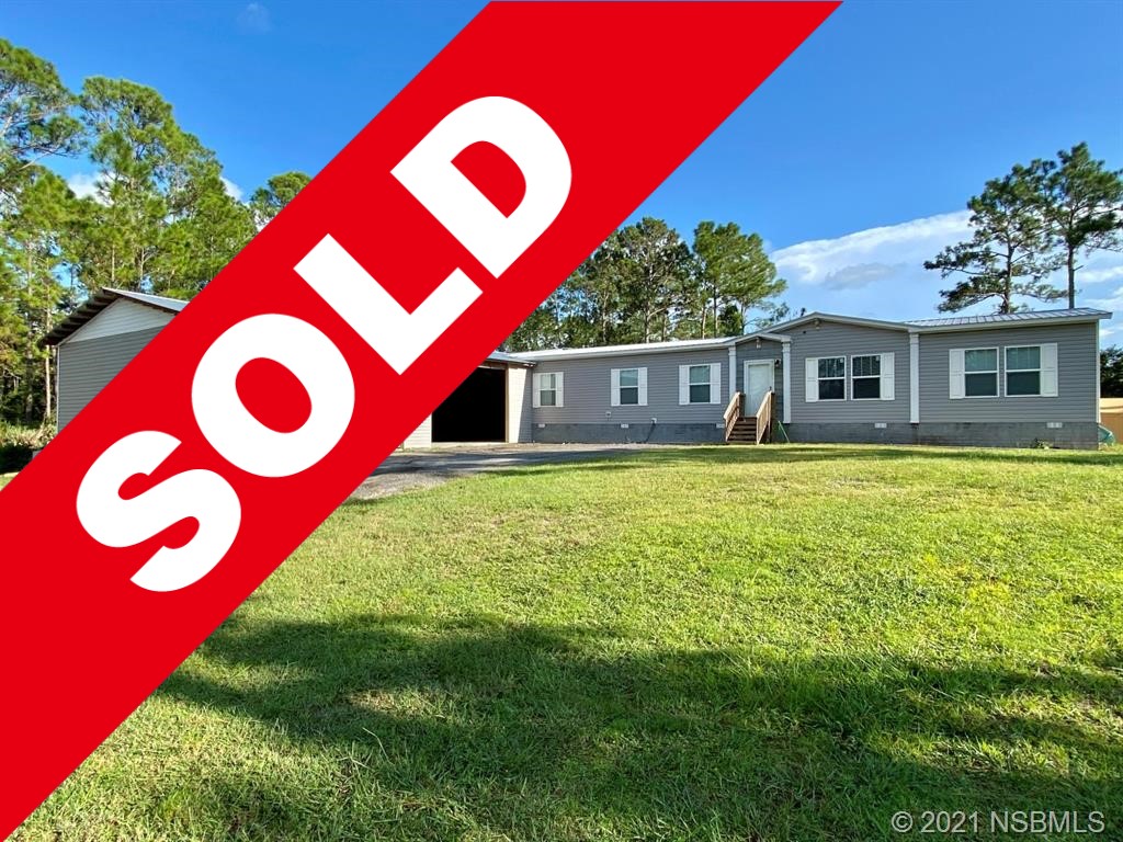 SOLD! Newer 4BR/2BA modular home with large garage on 2.5 acres!